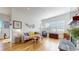 Inviting living room with a fireplace, hardwood floors, and comfortable seating at 22674 E Henderson Dr, Aurora, CO 80016