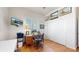 Bright office space with wood floors, a large closet, and a flatscreen TV at 22674 E Henderson Dr, Aurora, CO 80016