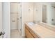 Traditional bathroom with a single sink vanity and tile flooring at 2434 S Williams St, Denver, CO 80210