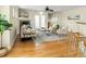 Comfortable living room featuring a fireplace, hardwood floors, and stylish furnishings at 2434 S Williams St, Denver, CO 80210