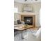 Cozy living room featuring a fireplace and comfortable seating at 2434 S Williams St, Denver, CO 80210