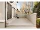 Spacious concrete patio, perfect for outdoor entertaining and relaxation at 2434 S Williams St, Denver, CO 80210