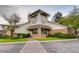 Attractive building exterior with brick accents, a well-manicured lawn, and a brick pathway at 13732 E Lehigh Ave # H, Aurora, CO 80014