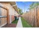 Backyard showcasing a walkway along the side of the house at 1432 Xanthia St, Denver, CO 80220