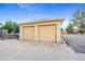 Two-car garage with off street parking and alley access at 1432 Xanthia St, Denver, CO 80220