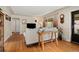 Inviting living room featuring hardwood floors and a comfortable seating arrangement at 1432 Xanthia St, Denver, CO 80220