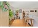 Bright living room with hardwood floors, stylish decor, and an open doorway at 1432 Xanthia St, Denver, CO 80220