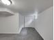 Basement area features new carpet, closet, and a window to allow natural light at 11422 W 17Th Pl, Lakewood, CO 80215