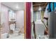 Basement bathroom with toilet, sink, and laundry hookups at 12573 W 8Th Ave, Golden, CO 80401