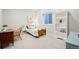 Bright bedroom with stylish furnishings, great natural light, and closet bookcase at 18267 W 95Th Ave, Arvada, CO 80007