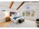Charming bedroom featuring vaulted ceiling with beams and a large window with neighborhood view at 18267 W 95Th Ave, Arvada, CO 80007