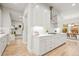 Bright, modern kitchen with white cabinetry, stainless steel appliances, and an open layout at 18267 W 95Th Ave, Arvada, CO 80007