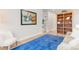 Cozy living room featuring modern art, a bookshelf, and stylish decor at 18267 W 95Th Ave, Arvada, CO 80007