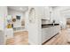 Stylish mudroom featuring built-in storage, bench seating, and a convenient entry to the home at 18267 W 95Th Ave, Arvada, CO 80007