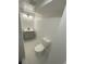 Bathroom featuring a toilet and a sink at 201 S Monmouth Ave, Firestone, CO 80520