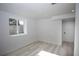 Bedroom with a large window for natural light at 201 S Monmouth Ave, Firestone, CO 80520