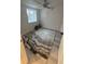 Bedroom featuring a ceiling fan and a rug with a gray pattern at 201 S Monmouth Ave, Firestone, CO 80520