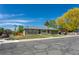 Charming single-story brick home with an attached two car garage and a well manicured lawn at 201 S Monmouth Ave, Firestone, CO 80520