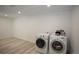 Laundry room featuring modern appliances at 201 S Monmouth Ave, Firestone, CO 80520