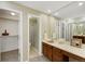 Functional bathroom with double sinks, walk-in shower, and ample counter space at 14192 E Baltic Pl, Aurora, CO 80014