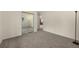 Bedroom features neutral walls, closet with mirrored doors, and plush carpeting at 14192 E Baltic Pl, Aurora, CO 80014