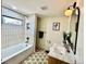 Stylish bathroom featuring patterned tile flooring, modern fixtures, and a bright, airy atmosphere at 601 W Layton Ave, Englewood, CO 80110
