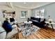 Cozy living room showcasing stylish furniture, area rug, and abundant natural light at 601 W Layton Ave, Englewood, CO 80110