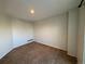 Simple carpeted bedroom with neutral walls and ample space at 12484 W Nevada Pl # 210, Lakewood, CO 80228