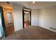 Bedroom with carpet flooring, access to the bathroom, and ample space at 12484 W Nevada Pl # 210, Lakewood, CO 80228