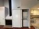 Stackable washer and dryer tucked away in a closet at 12484 W Nevada Pl # 210, Lakewood, CO 80228