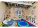 Finished basement featuring playroom with colorful and educational elements at 1262 High Point Trl, Elizabeth, CO 80107