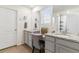 A beautifully designed bathroom with dual vanities, granite countertops, and modern fixtures at 1262 High Point Trl, Elizabeth, CO 80107