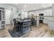Open dining area connected to kitchen with stainless appliances and a breakfast bar at 1262 High Point Trl, Elizabeth, CO 80107