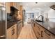 Beautiful kitchen with wood cabinets and an open floor plan design at 4301 Osceola St, Denver, CO 80212