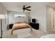 Cozy bedroom featuring a ceiling fan and neutral carpeting at 16102 E 47Th Pl, Denver, CO 80239