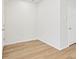 Cozy bedroom boasts wood floors, neutral walls, and a closet at 6532 N Malaya St, Aurora, CO 80019