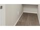 This is a carpeted closet space with built-in shelving, perfect for storage at 6532 N Malaya St, Aurora, CO 80019