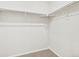 A walk-in closet with carpet and shelves at 6532 N Malaya St, Aurora, CO 80019