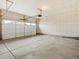 Clean and spacious unfinished garage with smooth concrete floors at 6532 N Malaya St, Aurora, CO 80019