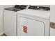 White Whirlpool washer and dryer in laundry room at 6532 N Malaya St, Aurora, CO 80019
