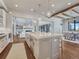 Spacious open floor plan features an oversized kitchen island and hardwood floors throughout at 2690 Fox View Trl, Franktown, CO 80116