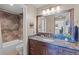 Well-appointed bathroom with custom wood framed mirror at 100 S Park Ave # E321, Breckenridge, CO 80424