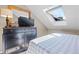 Bright bedroom featuring a skylight and modern dresser at 100 S Park Ave # E321, Breckenridge, CO 80424