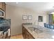 Close up of the kitchen area featuring stainless steel appliances, granite countertops, and tiled backsplash at 100 S Park Ave # E321, Breckenridge, CO 80424