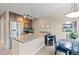 Modern kitchen with stainless steel appliances, granite countertops, and a wine cooler for entertaining at 100 S Park Ave # E321, Breckenridge, CO 80424