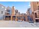 This community area has patios with tables and chairs, plus direct access to apartments at 100 S Park Ave # E321, Breckenridge, CO 80424