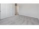 Neutral bedroom with plush carpeting, double door closet, and plenty of natural light at 9992 Racine St, Commerce City, CO 80022