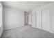 Neutral bedroom features new carpet, and large closet space at 9992 Racine St, Commerce City, CO 80022