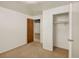 Neutral bedroom with carpet flooring, closet and natural light at 6800 Fern Dr, Denver, CO 80221