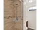 Shower stall with tile surround and adjustable shower head at 6800 Fern Dr, Denver, CO 80221